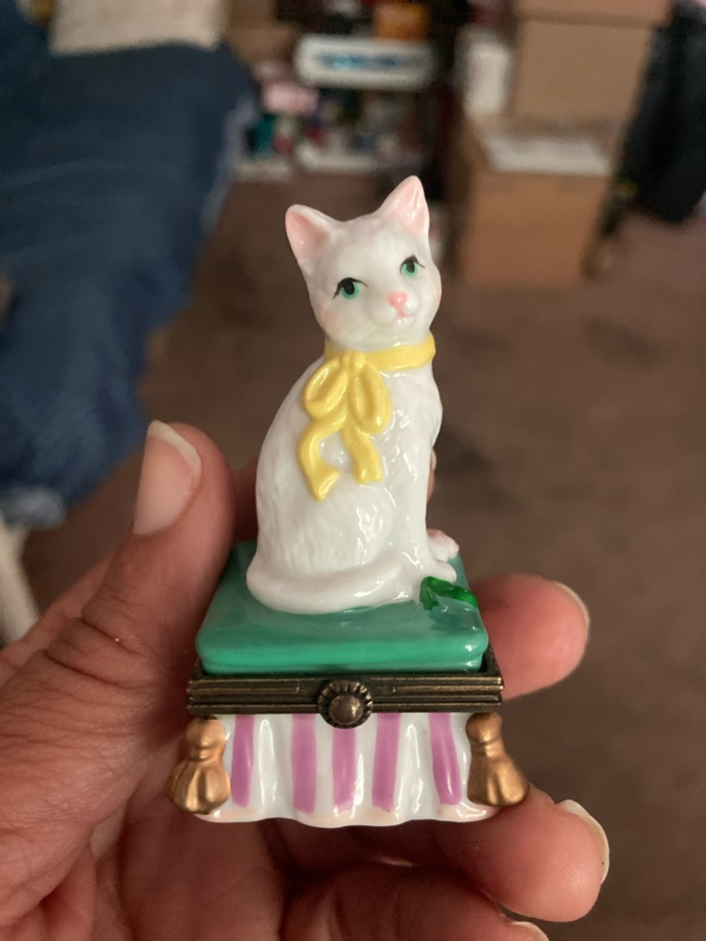 White Ceramic Cat Figurine with Yellow Bow on Green Base - Unbranded
